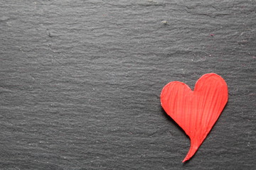 red heart or hearts on a black or dark gray background