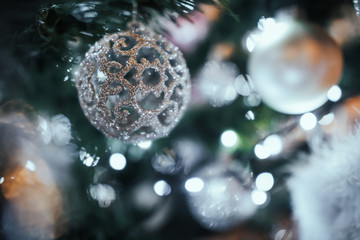 Decorated Christmas tree on background.