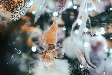 Decorated Christmas tree on background.