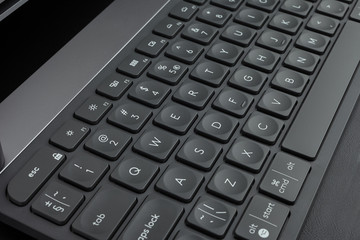 Close-up black keyboard keys QWETRY