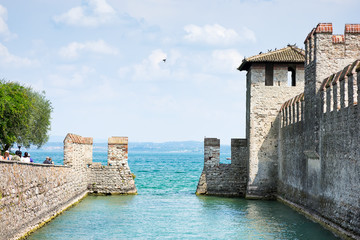 Fototapeta premium Scaligero Castle is a fortress in the historical center of Sirmione town at the Garda Lake in Italy