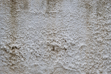 Plastered painted wall texture background, white beige color.
