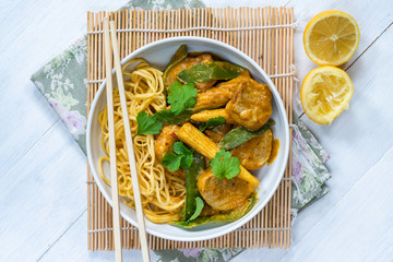 Satay pork curry with egg noodles - overhead view