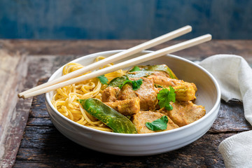 Satay pork curry with egg noodles