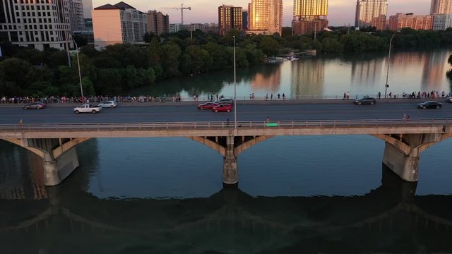 Cinematic Congress Avenue Bridge at Sunset with Reflections and Traffic - Austin Landmark