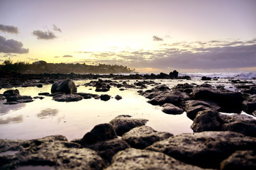 Fototapeta na wymiar Sunrise over the coast of Kauai, Hawaii.