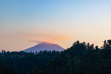 Mount Agung during sunrise view from Campuhan Ridge Walk, Ubud, Bali island, Indonesia.