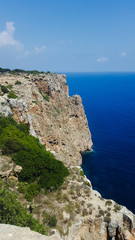 Cliff by the sea on Formentera island, Spain