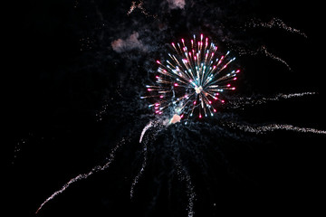 Multicolored fireworks exploding on the sky for New Year Celebration