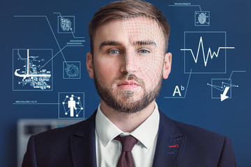 Portrait of handsome businessman in office