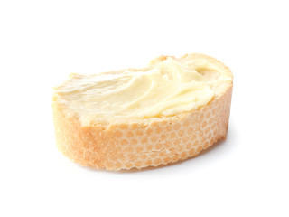 Slice of bread with butter on white background