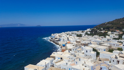 View of small town,look down on white houses on greek island Nisyros, Greece 