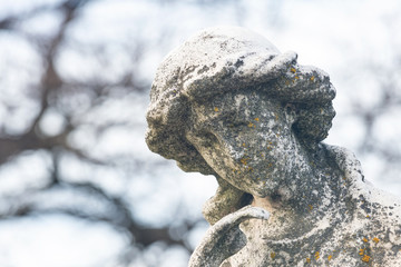 Beautiful Vintage Sculpture at old Catholic cemetery.