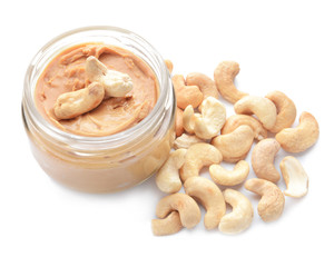 Jar of cashew butter on white background