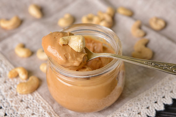 Jar of cashew butter on table