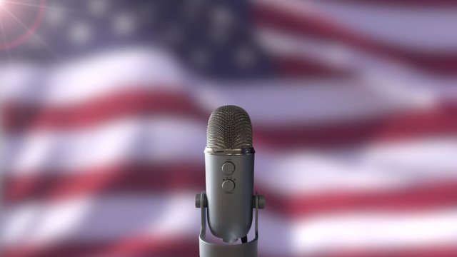 A Microphone In Front Of A Slow Motion USA Flag Ready For A Public Address From The President