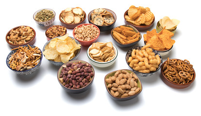 Salty snacks isolated on white
