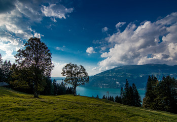 evening in switzerland with scenic view over lake in the alps