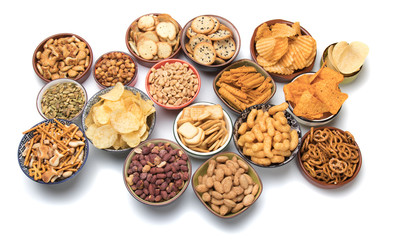 Salty snacks isolated on white