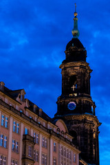 Obraz premium Tower of the Dresden Kreuzkirche (Church of the Holy Cross), Lutheran church in Dresden, Germany. Winter sunset scenery with dark blue sky.