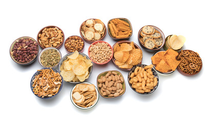 Salty snacks isolated on white
