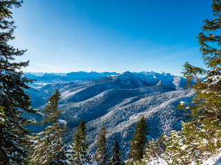 Mountain View from a Bavarian Top Point to the surrounding alp scenery during winter