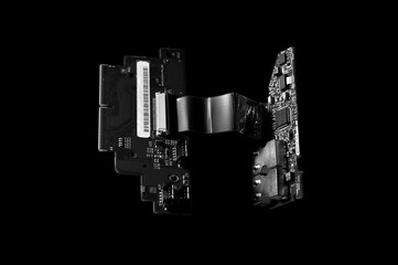 little circuit boards on dark background