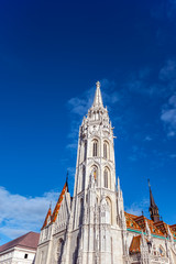 Fototapeta na wymiar Fragment of Matthias Church on Holy Trinity Square in Budapest, Hungary.