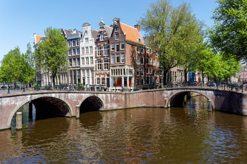 Fototapeta na wymiar Traditional Dutch townhouses at Keizersgracht canal in Amsterdam, Netherlands