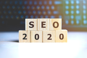 Seo 2020 concept. Wooden cubes on a black keyboard