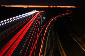 Highway lightpainting. Driven from car headlight light at night.