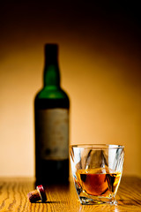 Whiskey Bottle and Cork and Crystal Tumbler  