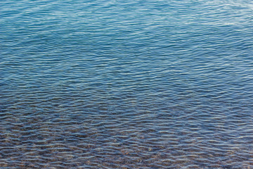 calm water background shallow bottom scenic view, copy space for your text