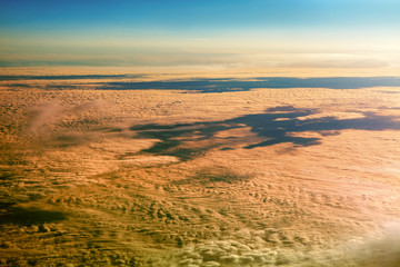 clouds light and shadows over the earth