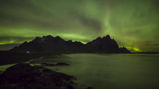 Northern Lights (Aurora borealis) over Stokksnes mountain range in Iceland