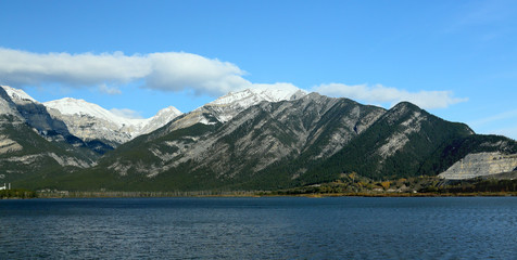 Blue lake with mountains in the background