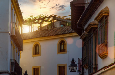 Cordoba streets at sunset in historic city center near the Mezquita Cathedral