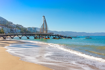 Puerto Vallarta, Mexico-20 December, 2019: Playa De Los Muertos beach and pier close to famous Puerto Vallarta Malecon, the city largest public beach © eskystudio