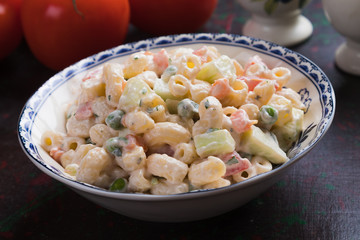 Homemade macaroni salad with vegetables