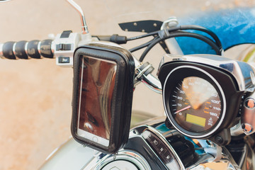Power outlet for charger mobilephone on a modern motorcycle,Close up and selective focus.