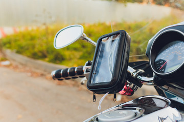 Power outlet for charger mobilephone on a modern motorcycle,Close up and selective focus.