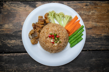 Fried Rice with Shrimp paste on white dish.