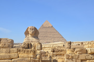 Great pyramid of Cheops and Sphinx in Giza plateau. The Great Pyramid of Giza at the back.