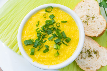 Delicious Corn Soup on a Wooden Table