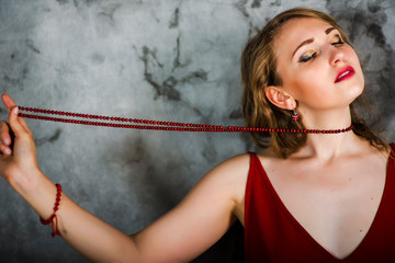 emotional girl with beads