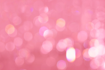 Fototapeta premium Beautiful pink bokeh close-up, abstract background, festive concept