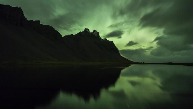 Northern Lights (Aurora borealis) over Stokksnes mountain range in Iceland