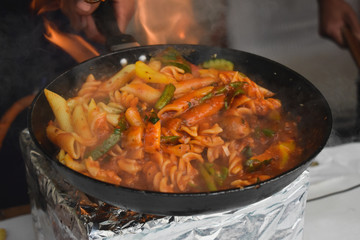 Pasta cooking in a pan