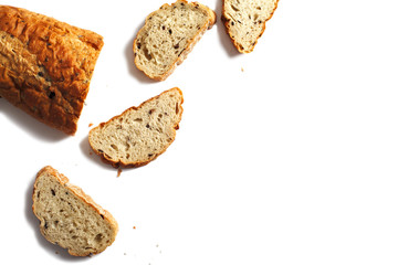Sliced Kalamata olive bread isolated on white background, top view.