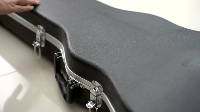 Open the guitar box